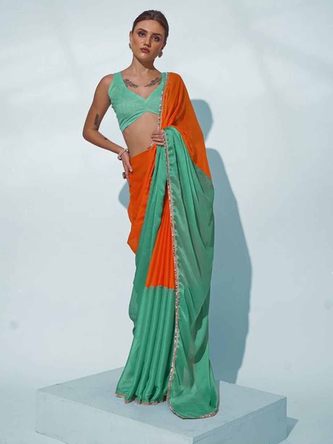 

Mitera Colourblocked Embellished Pure Chiffon Saree, Orange