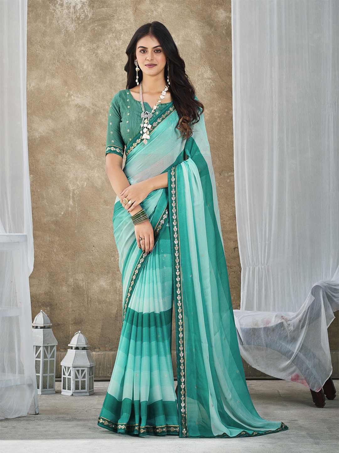 

Ethnielle Colorblocked Embroidered Pure Chiffon Saree, Teal