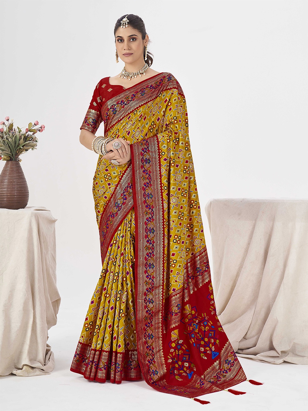 

Ethnielle Ethnic Motifs Zari Woven Patola Saree, Mustard