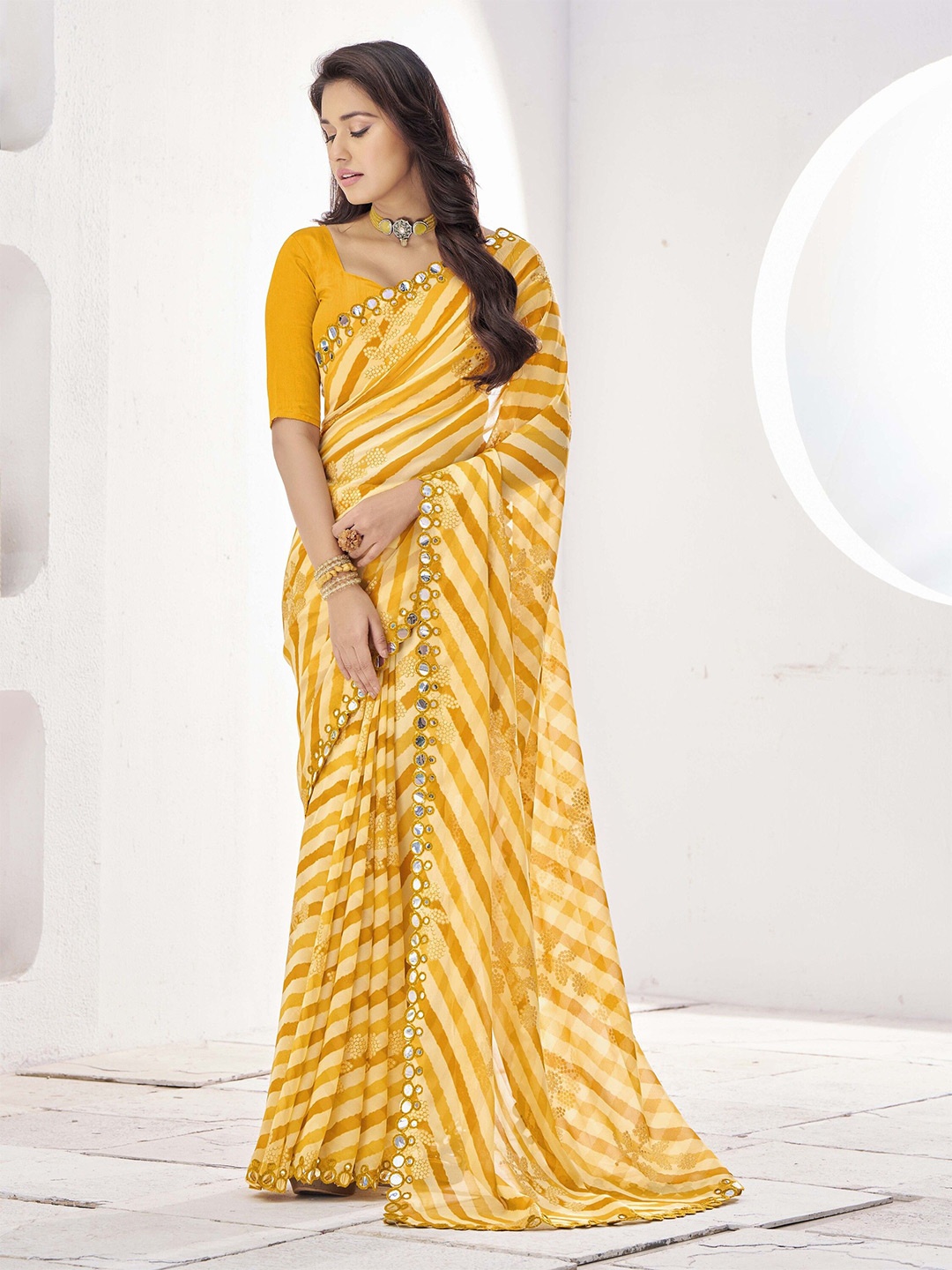 

Ethnielle Mirror Work Pure Georgette Leheriya Saree, Yellow