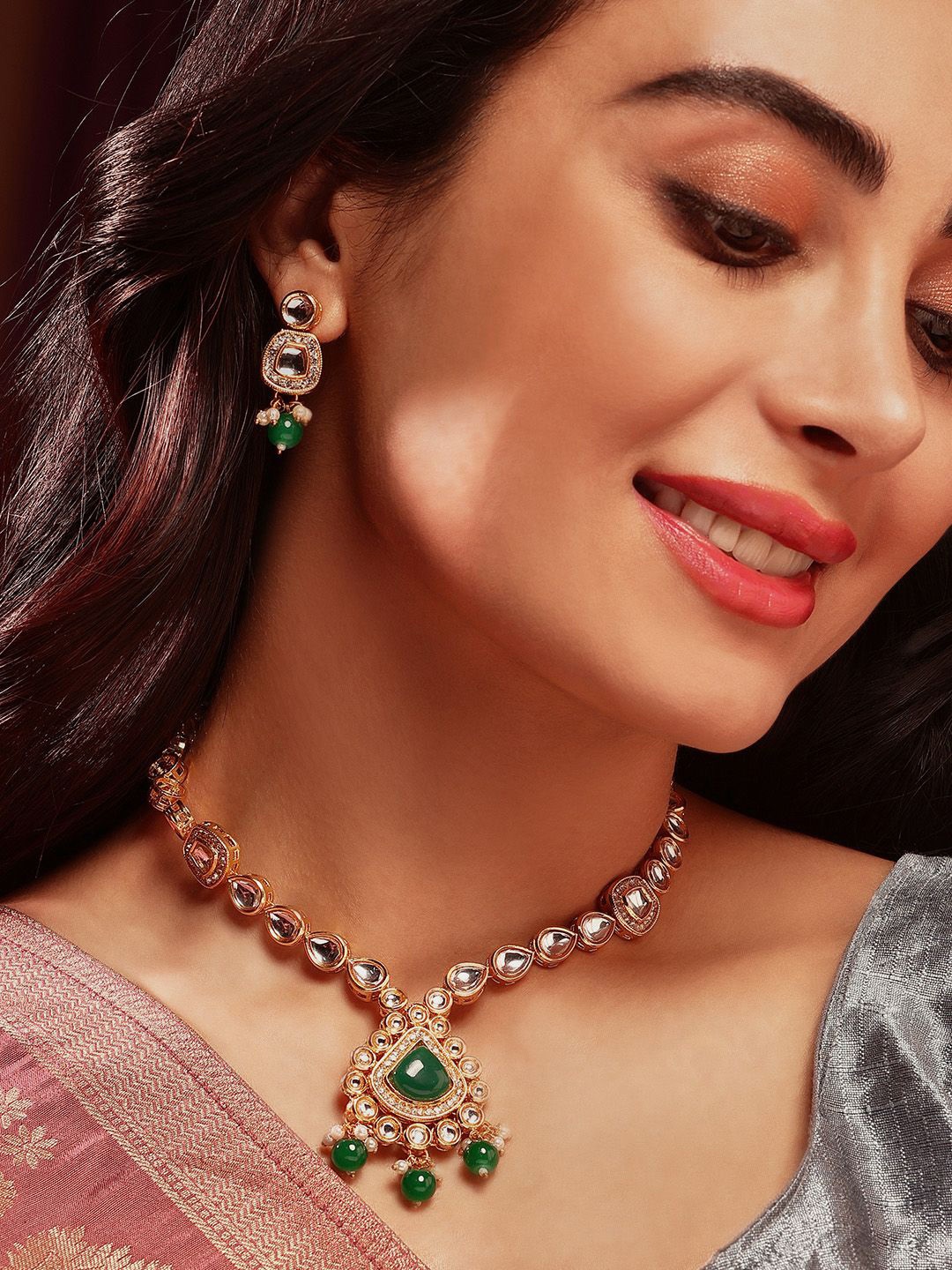 

Priyaasi Gold Plated Kundan Stone Studded & Beaded Jewellery Set