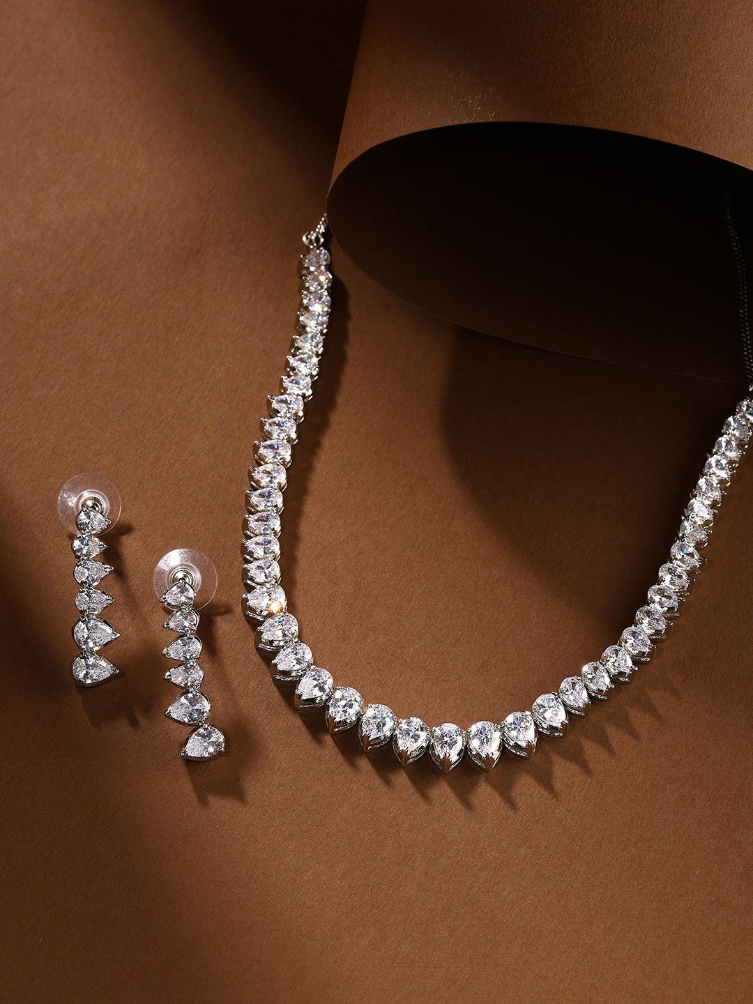 

Priyaasi Silver-Plated American Diamond Studded Jewellery Set