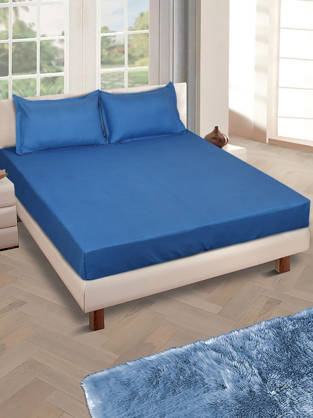 

Myntra Elegant Homes Blue Solid 160TC Microfiber Queen Fitted Bedsheet & 2 Pillow Covers