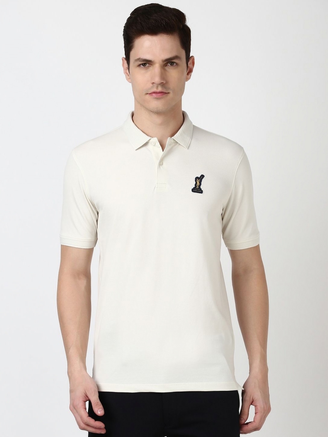 

Peter England Casuals Men Solid Polo Collar Cotton T-Shirt, Cream