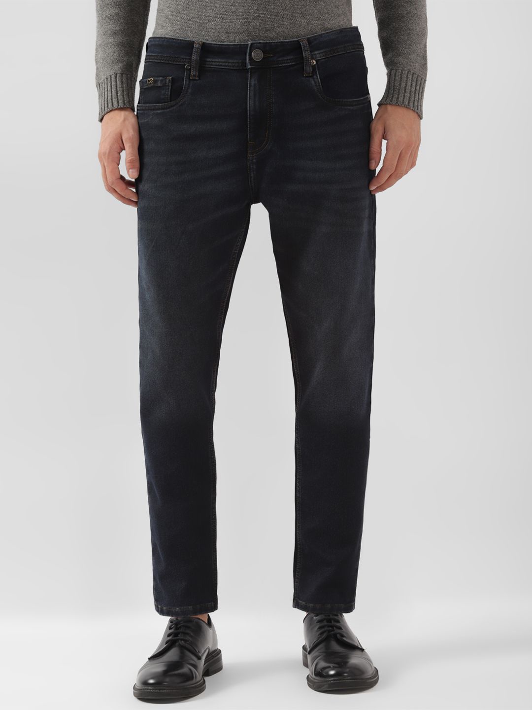 

Peter England Casuals Men Mid Rise Light Fade Slim Fit Cropped Jeans, Black