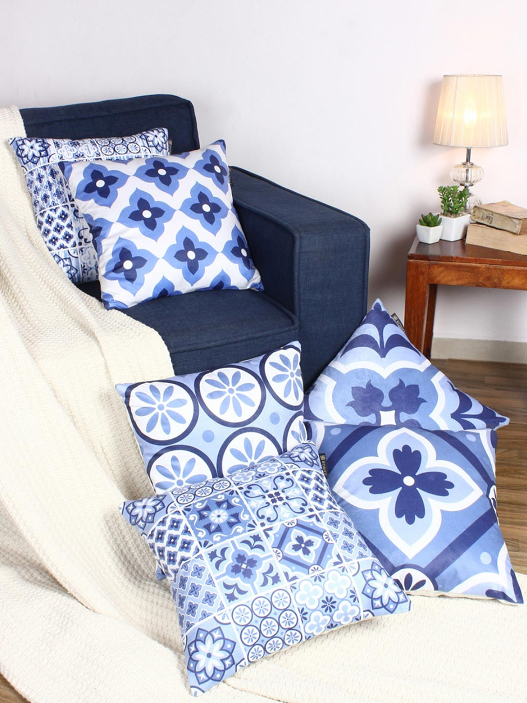 

Myntra Elegant Homes Blue & White 6 Pieces Floral Printed Velvet Square Cushion Covers