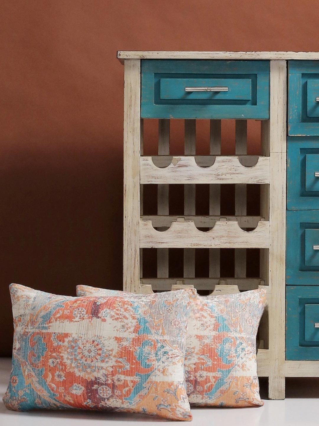 

Myntra Elegant Homes Blue & Orange 2 Pieces Ethnic Motifs Rectangle Cushion Covers