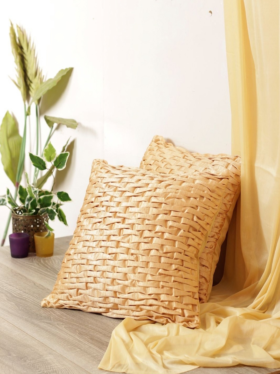 

Myntra Elegant Homes Beige 2 Pieces Geometric Textured Square Cushion Covers