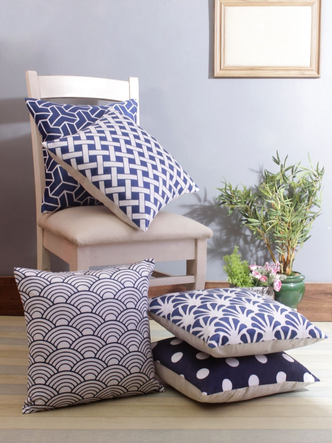 

Myntra Elegant Homes Blue & White 5 Pieces Geometric Printed Velvet Square Cushion Covers