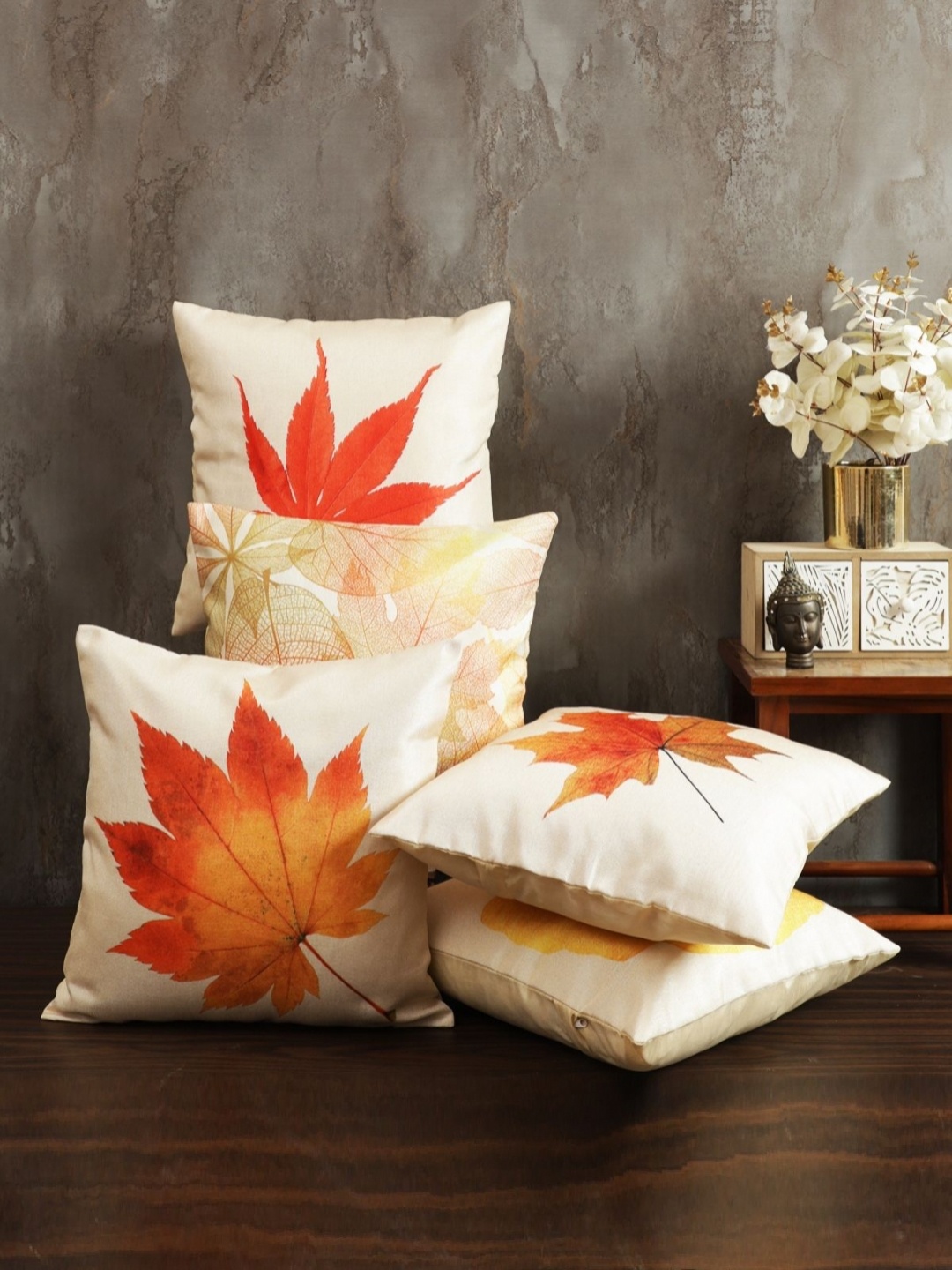 

Myntra Elegant Homes Beige & Orange 5 Pieces Floral Printed Square Cushion Covers