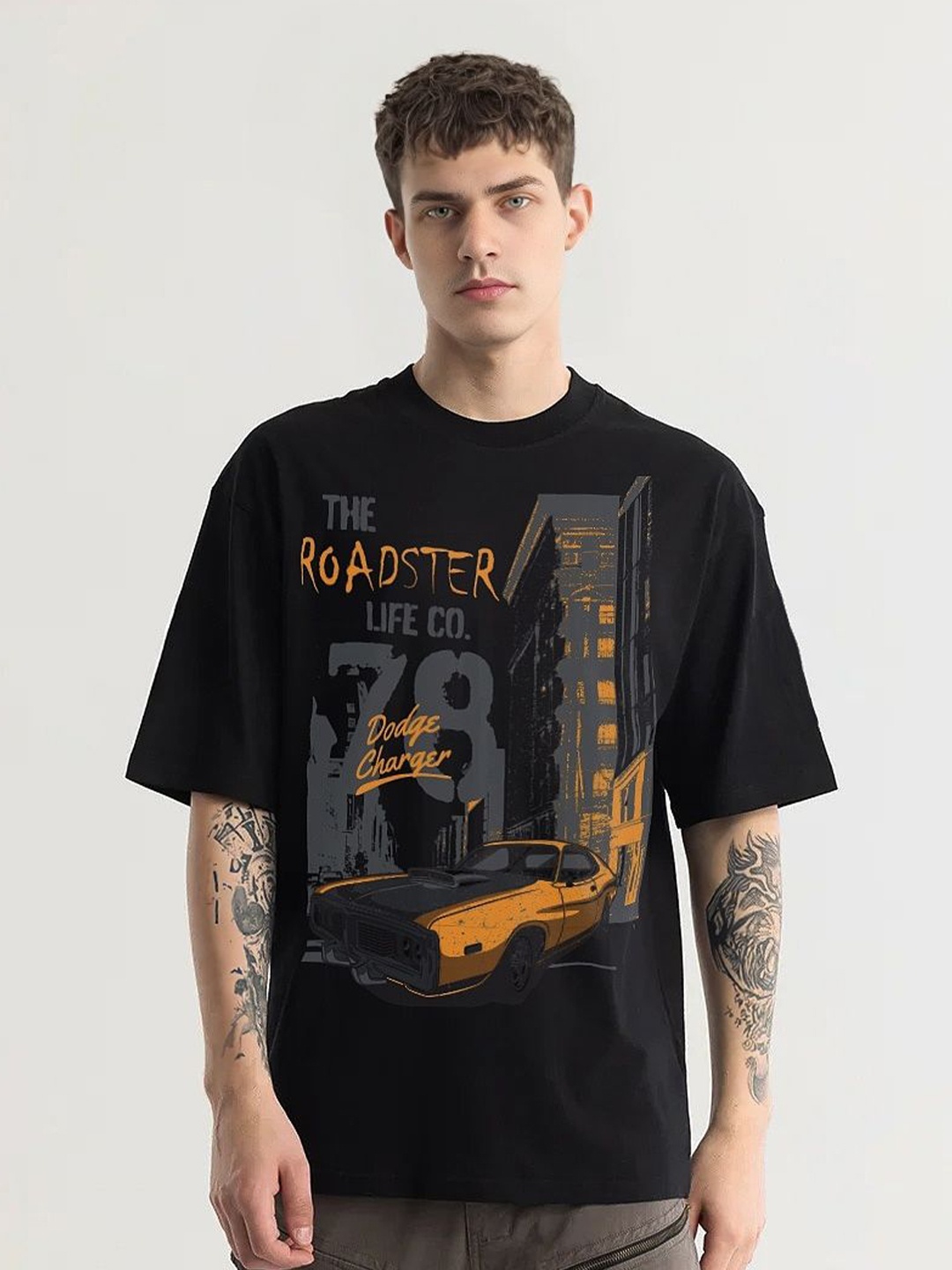 

The Roadster Lifestyle Co. Men Graphic Printed Round Neck Cotton Oversized T-Shirt, Black