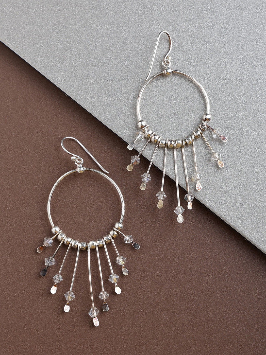 

Exotic India Crystals Sterling Silver Dangling Earrings