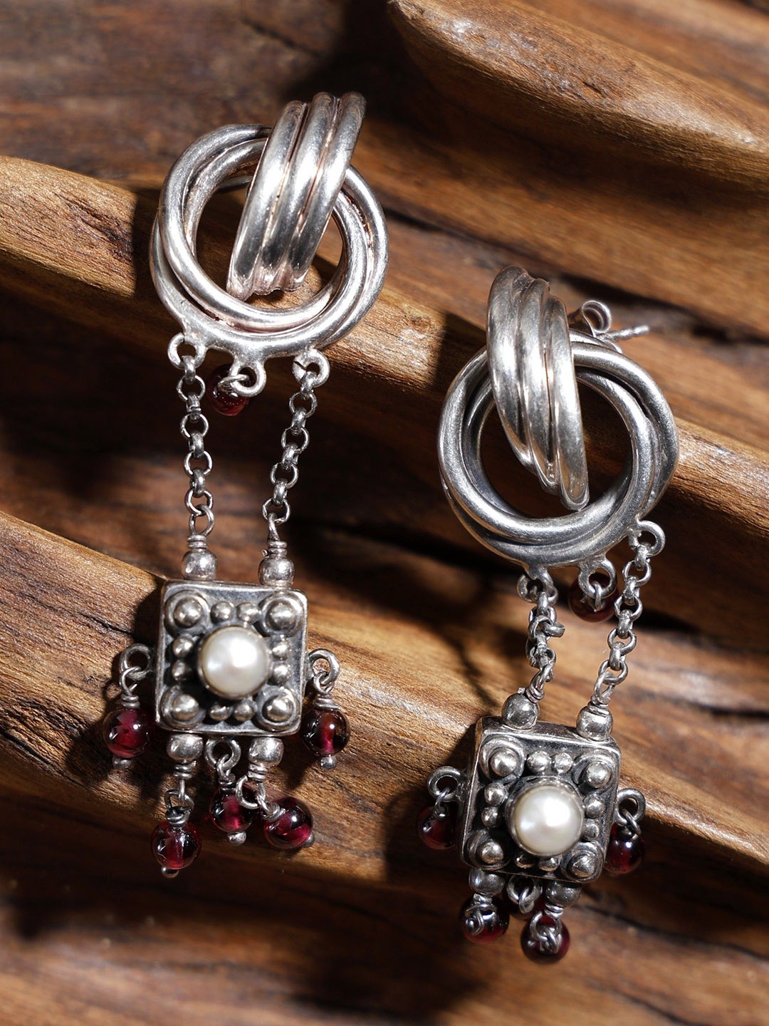 

Exotic India Sterling Silver Stylish Earrings