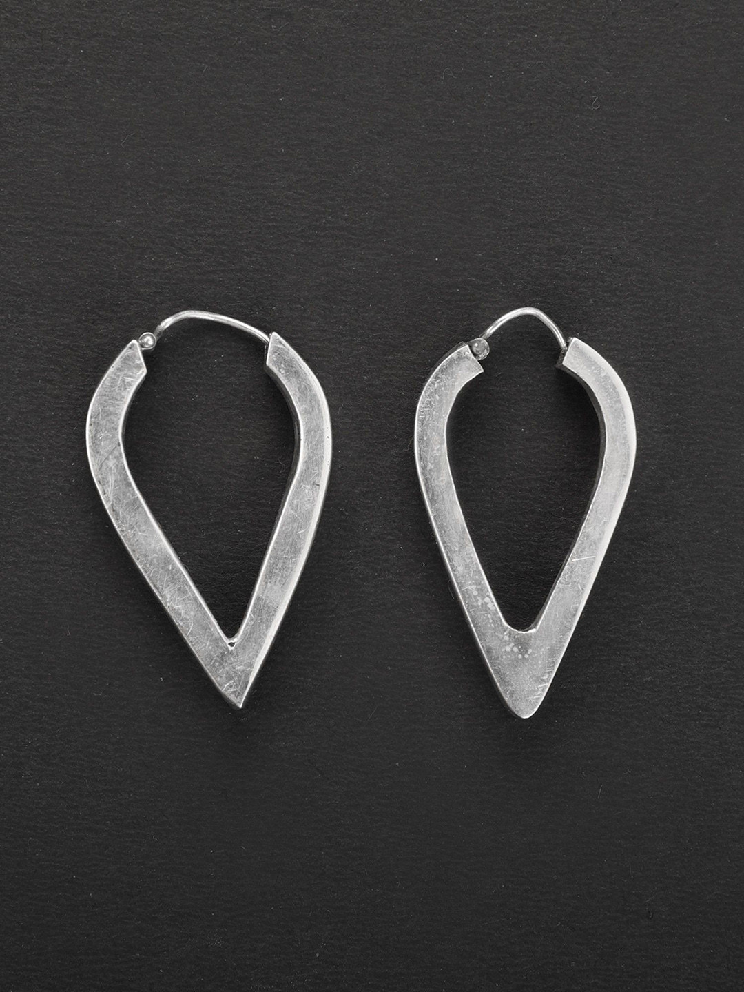 

Exotic India Sterling Silver-Plated Marquise Shaped Hoop Earrings