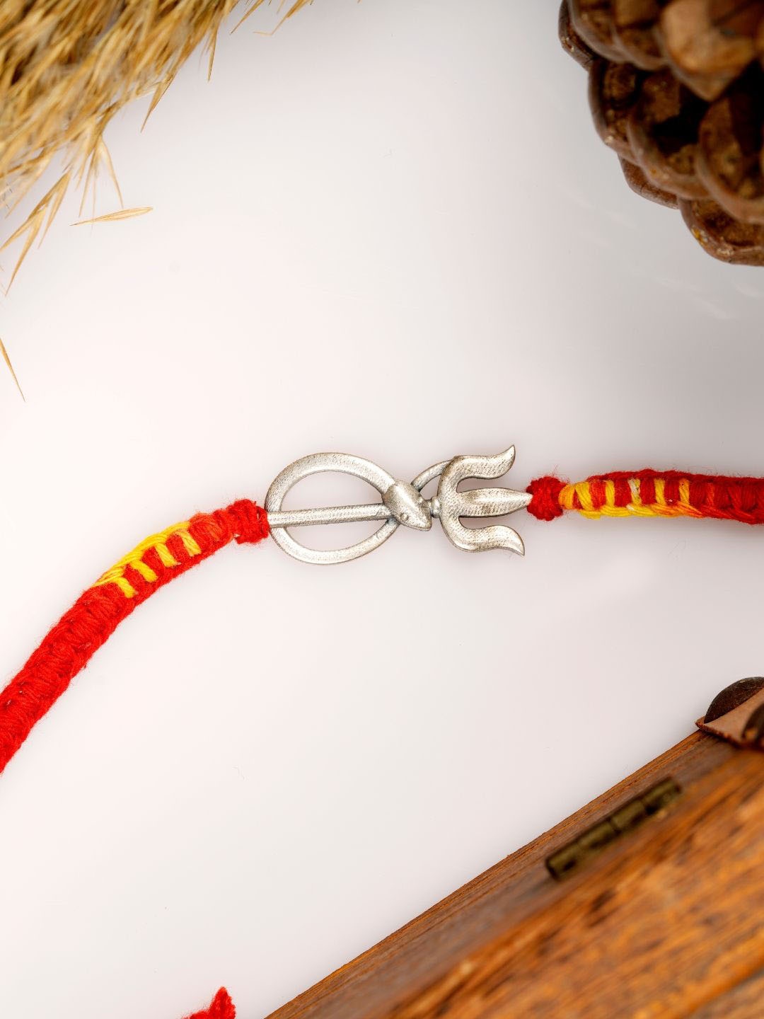 

JewelYaari 925 Sterling Silver Rishool Snake Charm Thread Rakhi With Roli Chawal