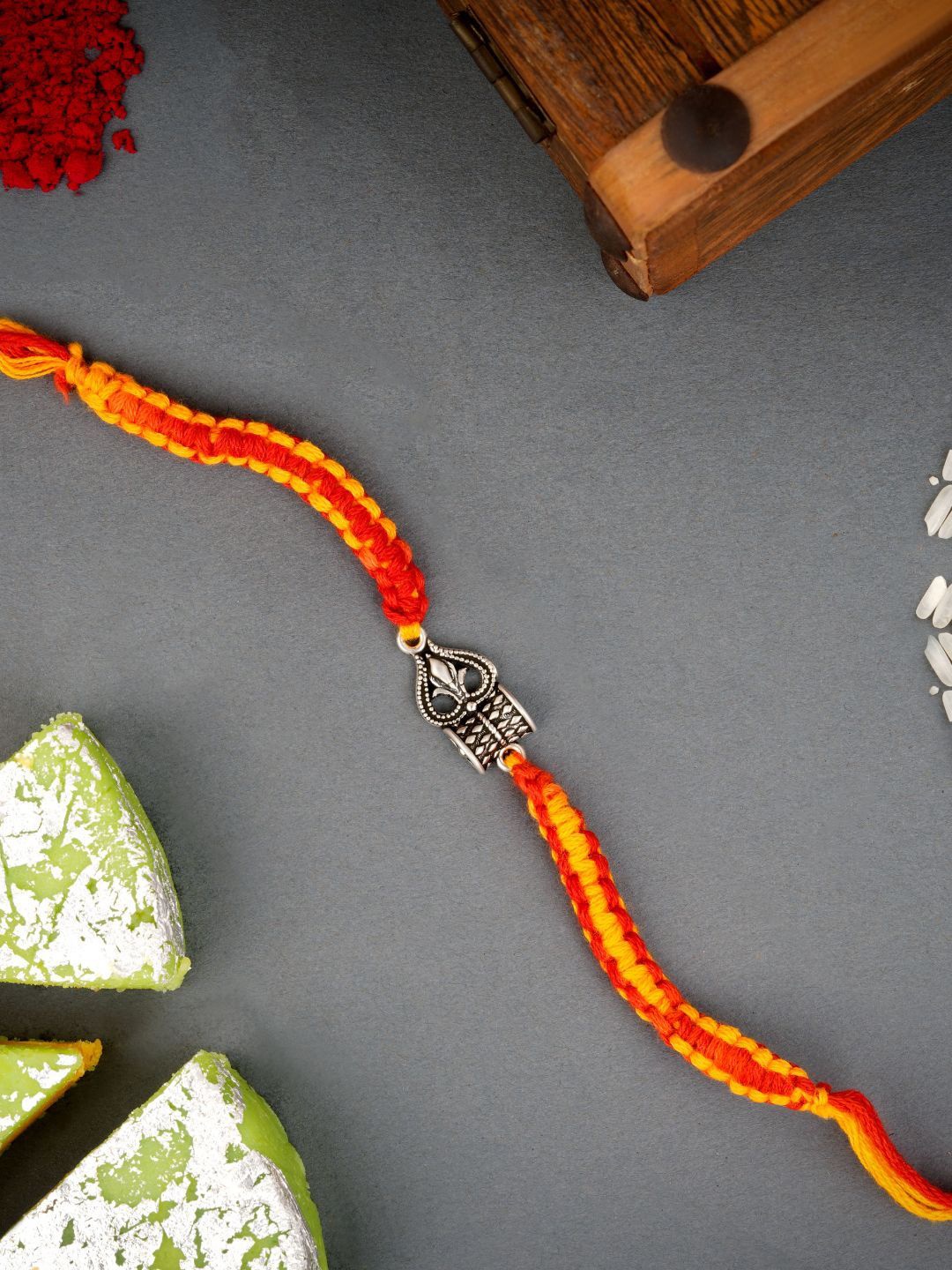 

JewelYaari Damru Trishool 925 Sterling Silver Thread Rakhi