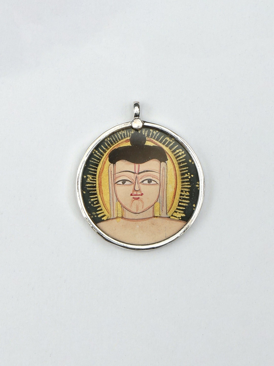 

Exotic India Lord Mahavira Jain Sterling Silver Pendant