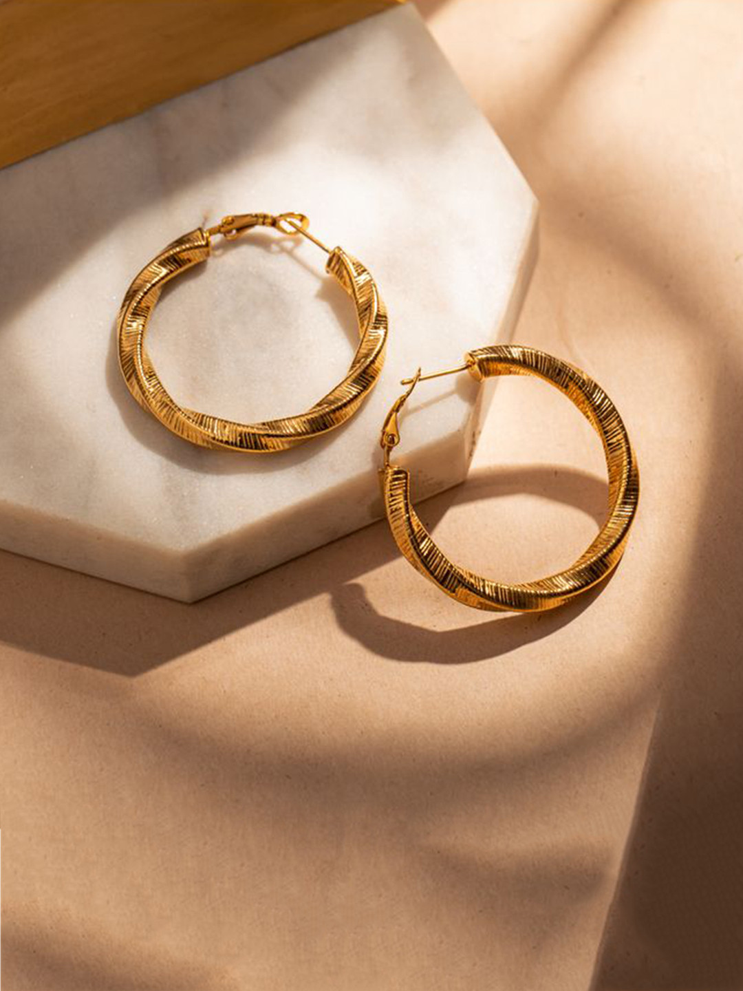 

Aura Studio 18KT Gold-Plated Stainless Steel Circular Hoop Earrings