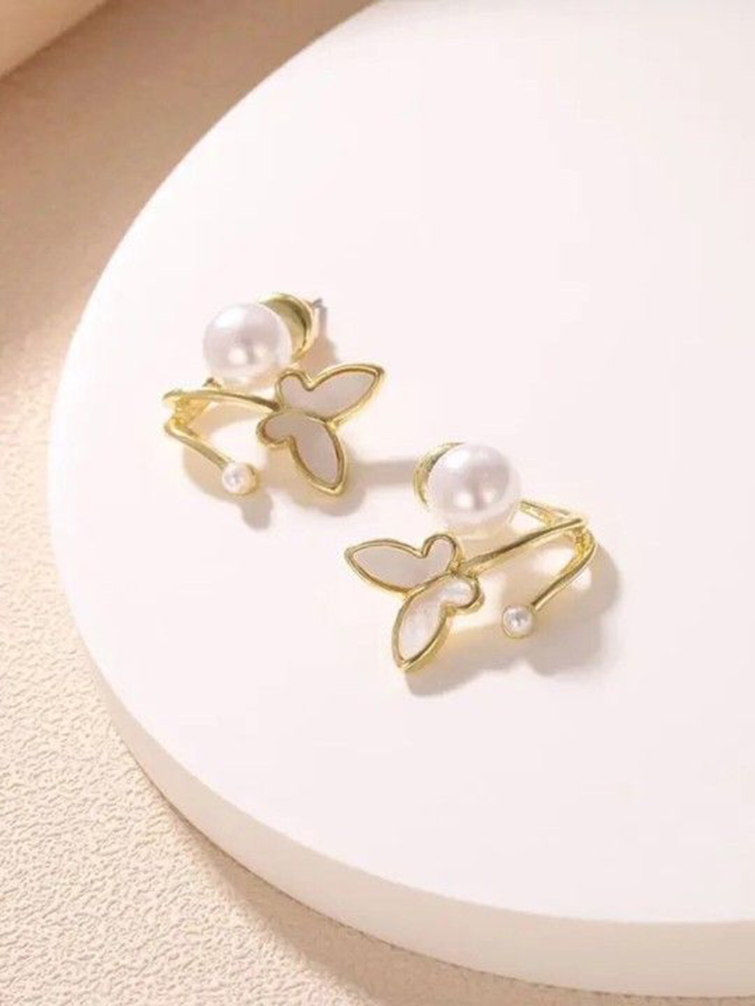 

Xivir Gold-Plated Pearl-Beaded Butterfly Shaped Studs Earrings