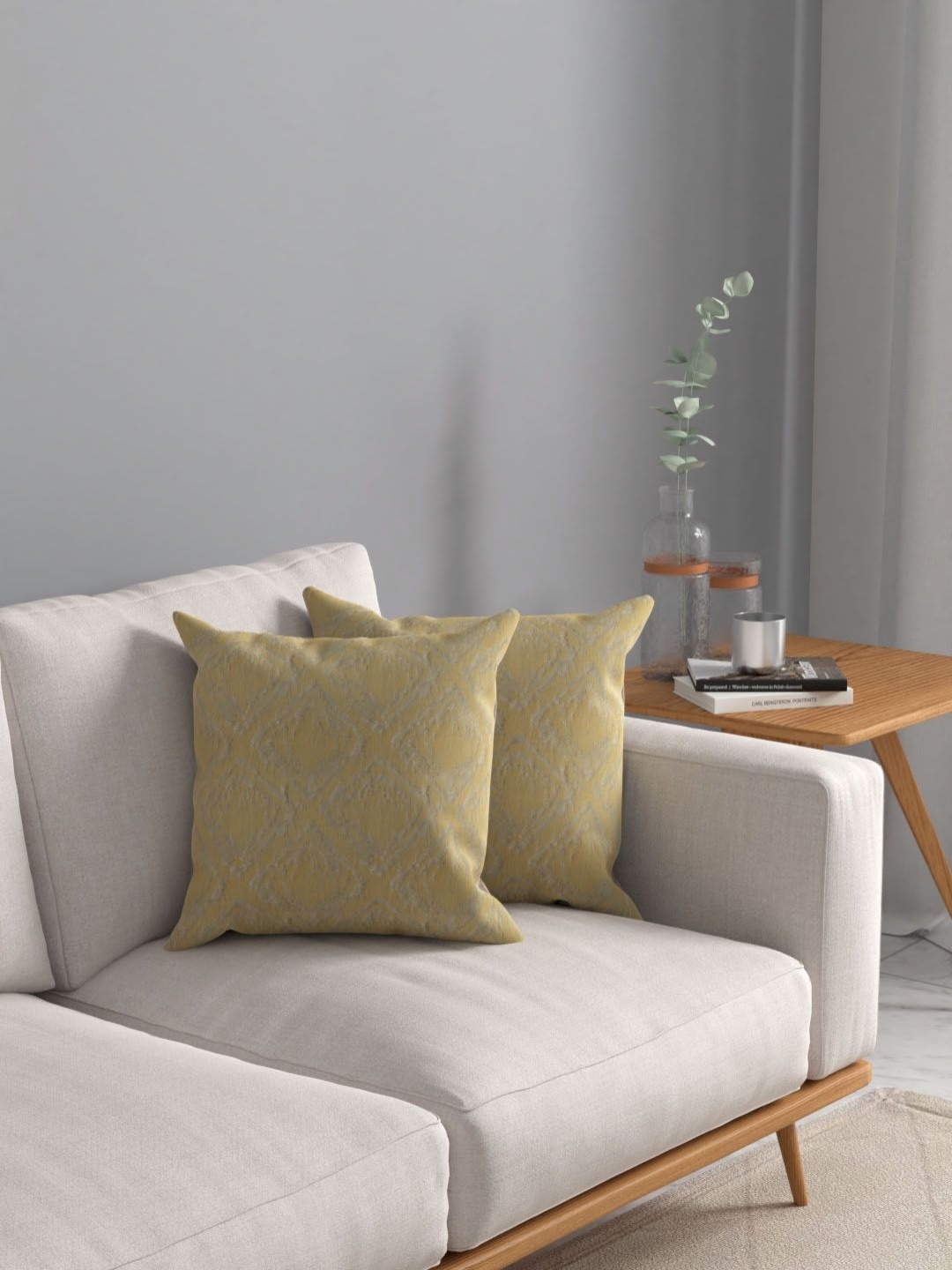 

Myntra Elegant Homes Mustard Yellow Self Design 2 Pieces Square Cushion Covers