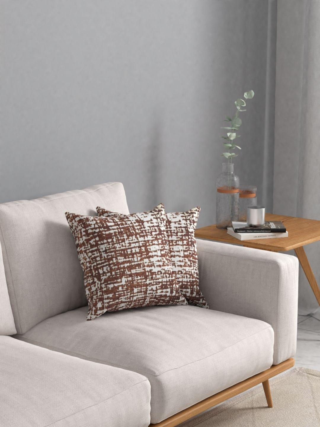 

Myntra Elegant Homes Brown & White 2 Pieces Abstract Printed Square Cushion Covers