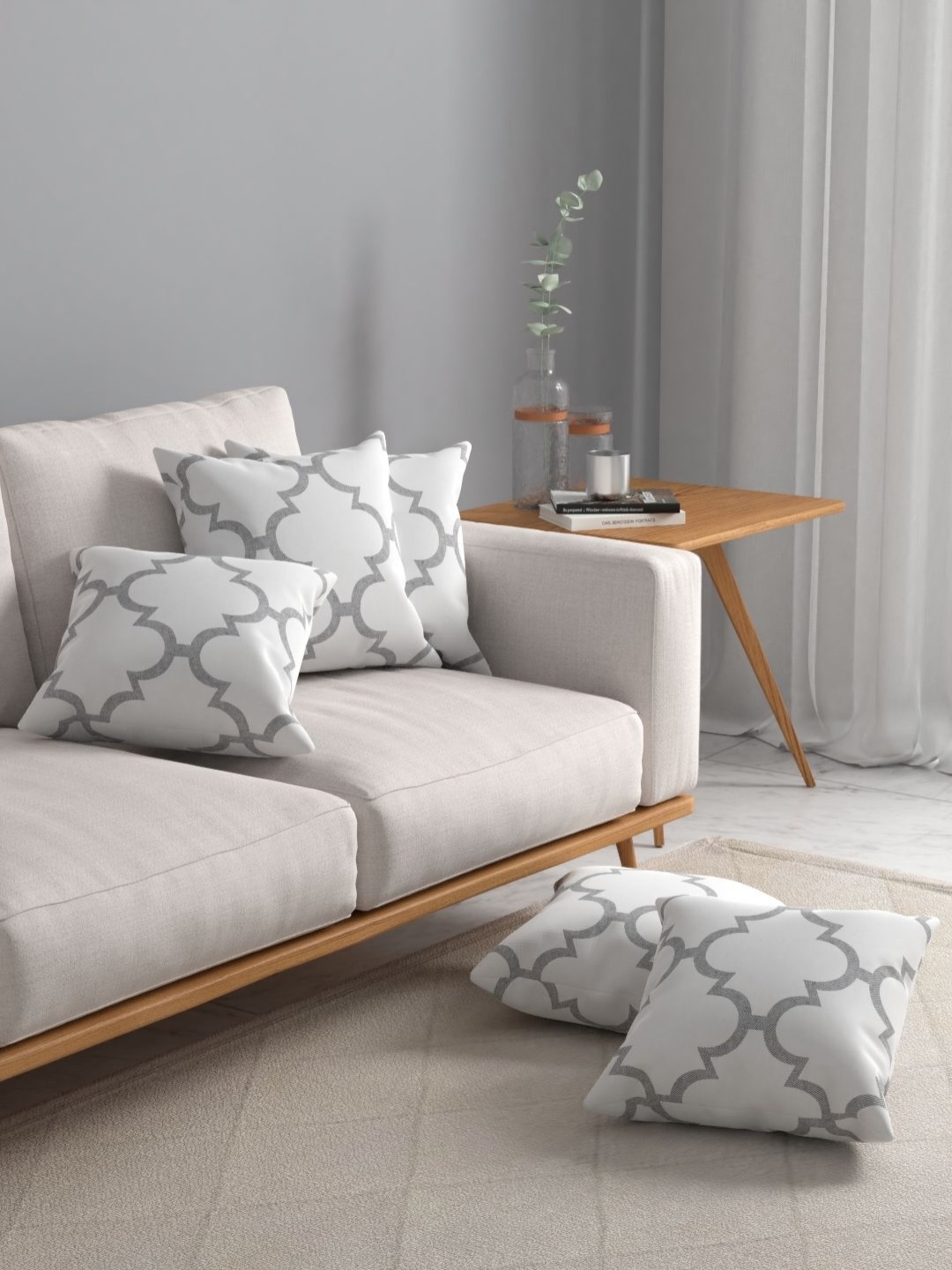 

Myntra Elegant Homes Grey & White 5 Pieces Geometric Square Cushion Covers