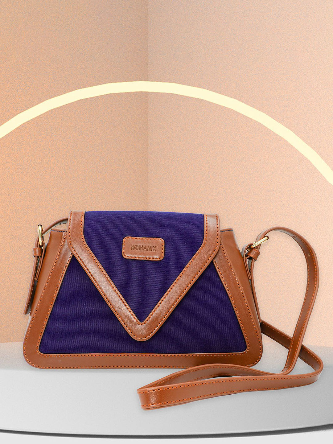 

Womanix Colourblocked Oversized Structured Handheld Bag with Applique, Blue