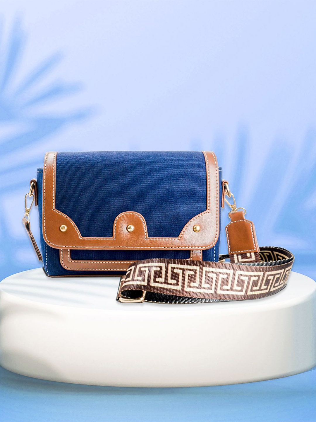 

Womanix Oversized Structured Handheld Bag with Cut Work, Blue