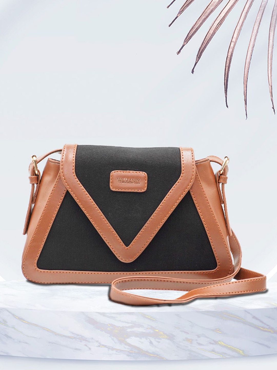 

Womanix Textured Structured Handheld Bag with Cut Work, Black