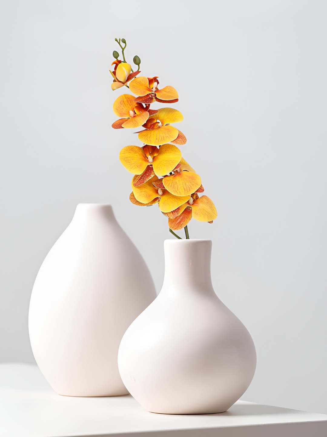 

THE HOME CO. Orange & Green Orchid Artificial Flower