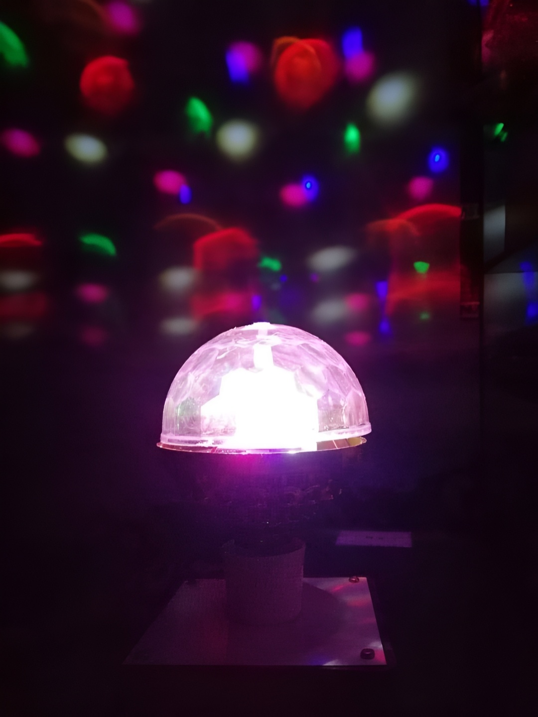 

ENORMITY Transparent & Gold Toned Textured LED Rotating Bulb