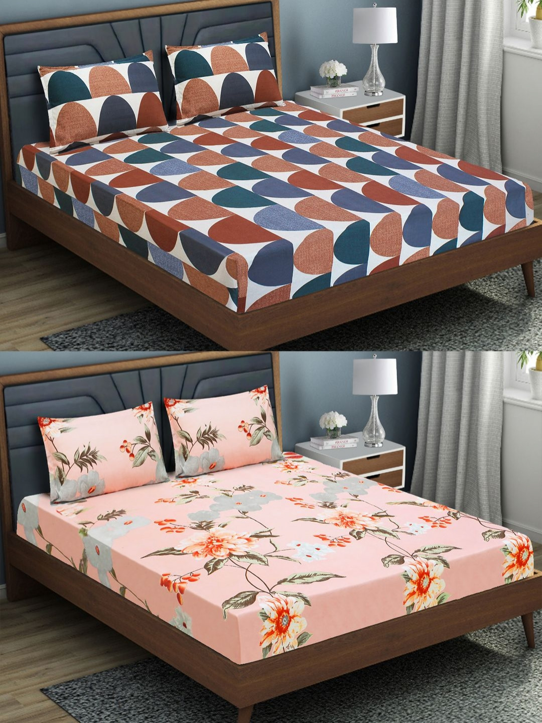 

Aura Peach & White Floral Microfiber Fitted 144 TC 2 Queen Bedsheet with 4 Pillow Covers