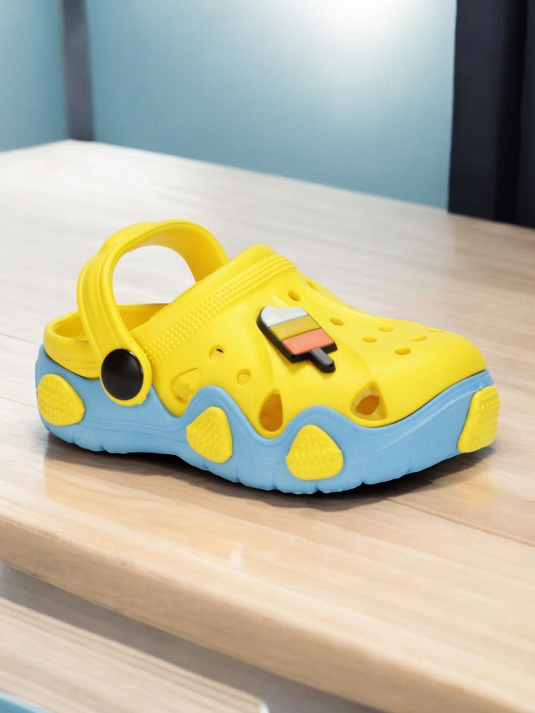 

Lil Lollipop Kids Self Design Anti Slip Back strap Clogs, Yellow