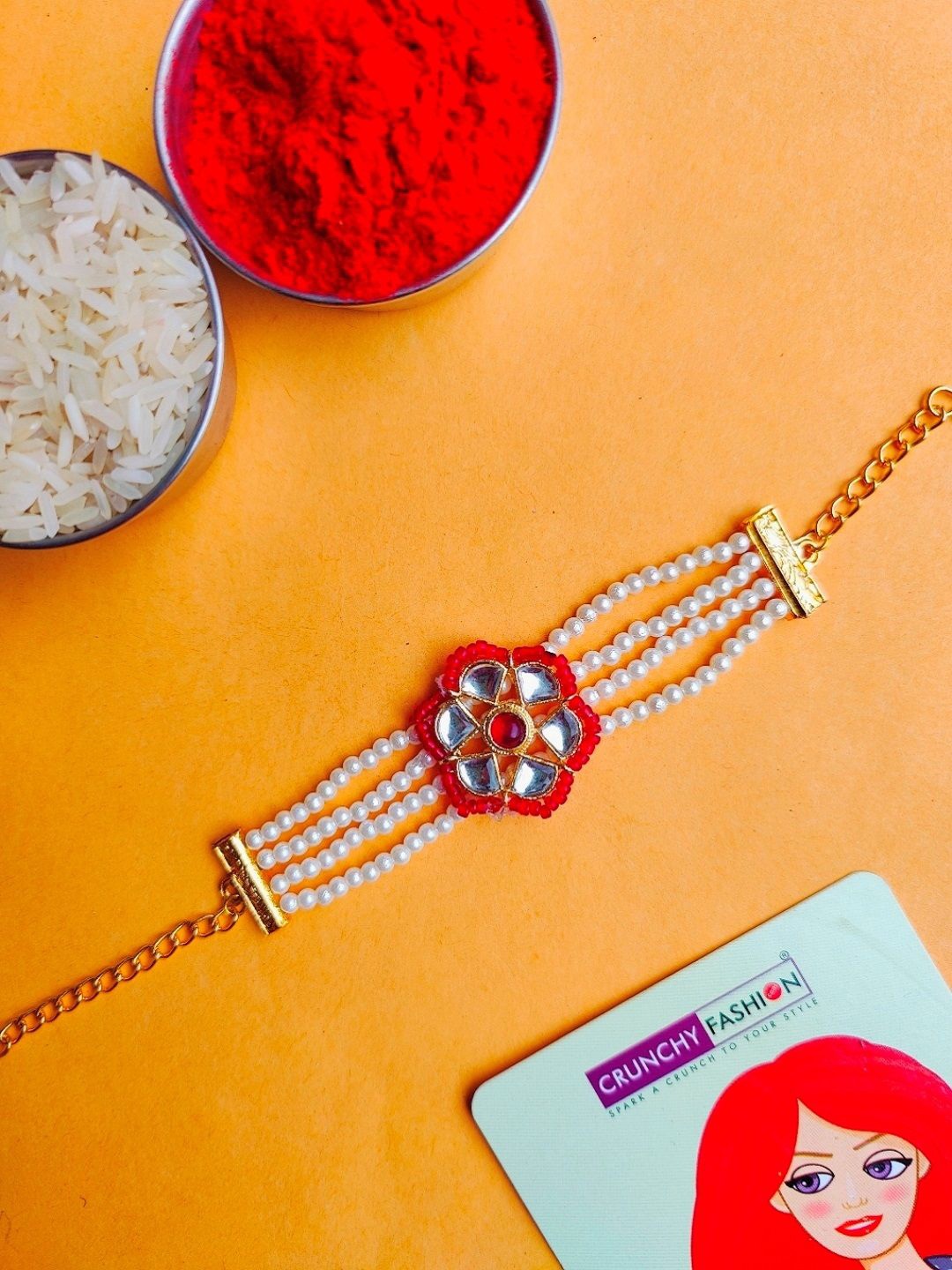 

Crunchy Fashion Kundan Flower Bracelet Rakhi With Roli & Chawal, Gold