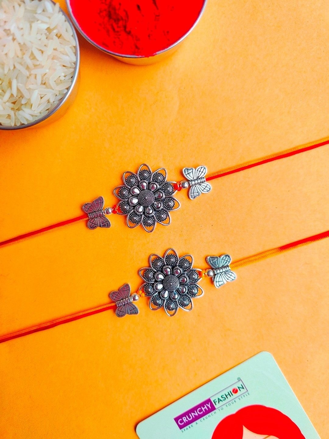

Crunchy Fashion Set Of 2 Floral Oxidised Thread Rakhi With Roli Chawal, Red