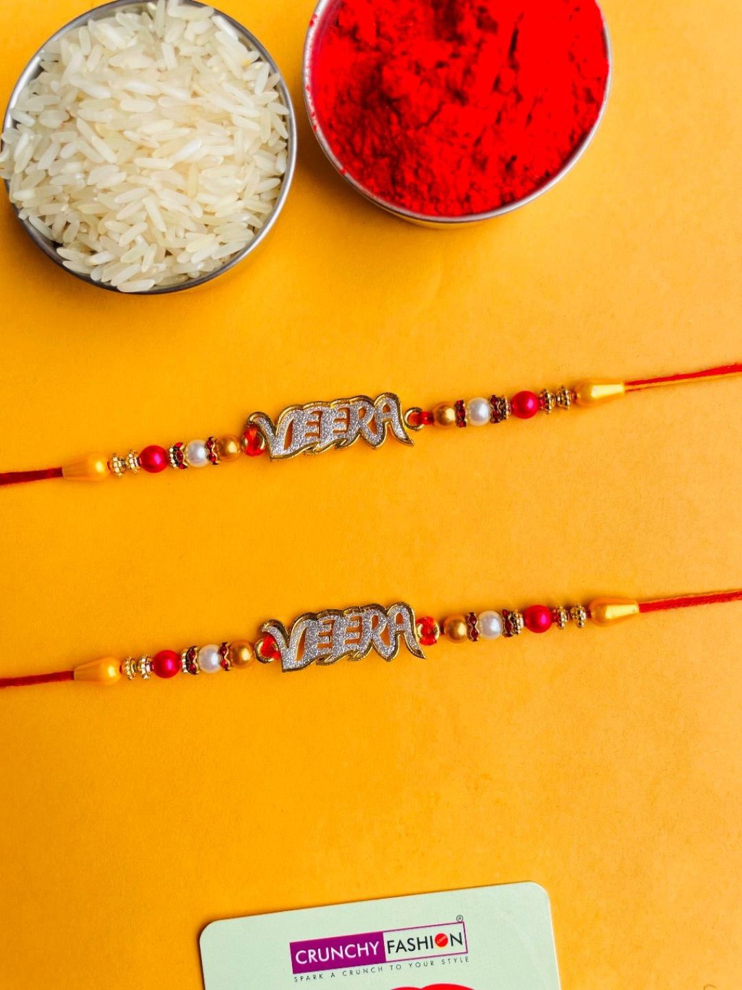

Crunchy Fashion Set Of 2 Beaded Thread Rakhi With Roli Chawal, Red