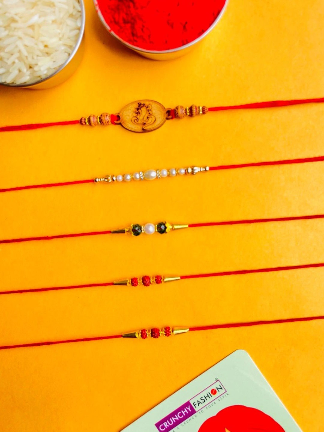 

Crunchy Fashion Set Of 5 Elegant Rudraksh and Beaded Thread Rakhi With Roli Chawal, Red