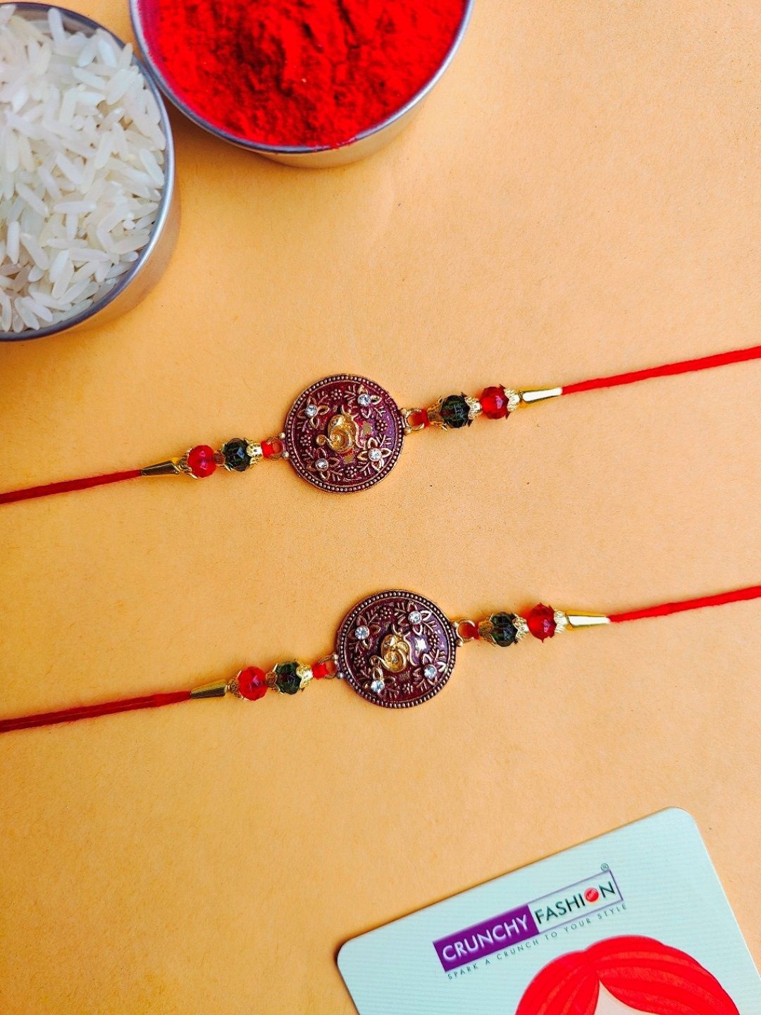

Crunchy Fashion Bhaiya Bhabhi Thread Rakhi With Roli Chawal, Red