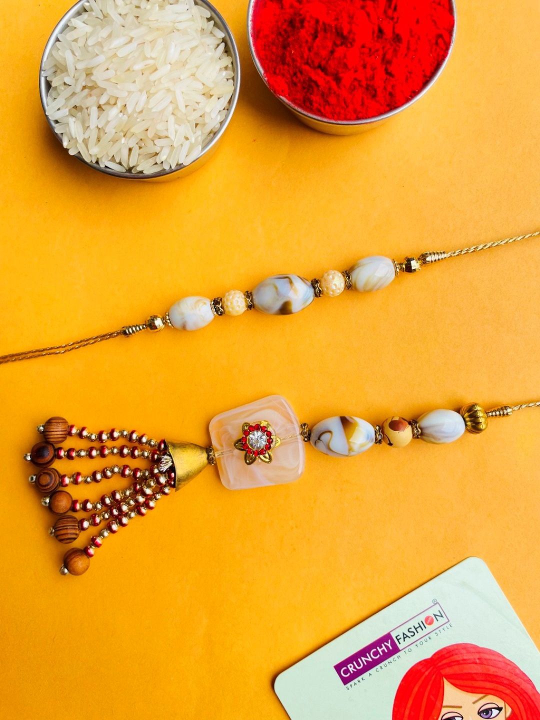 

Crunchy Fashion Set Of 2 Bhaiya Bhabhi Stone & Kundan Rakhi With Roli Chawal, Beige