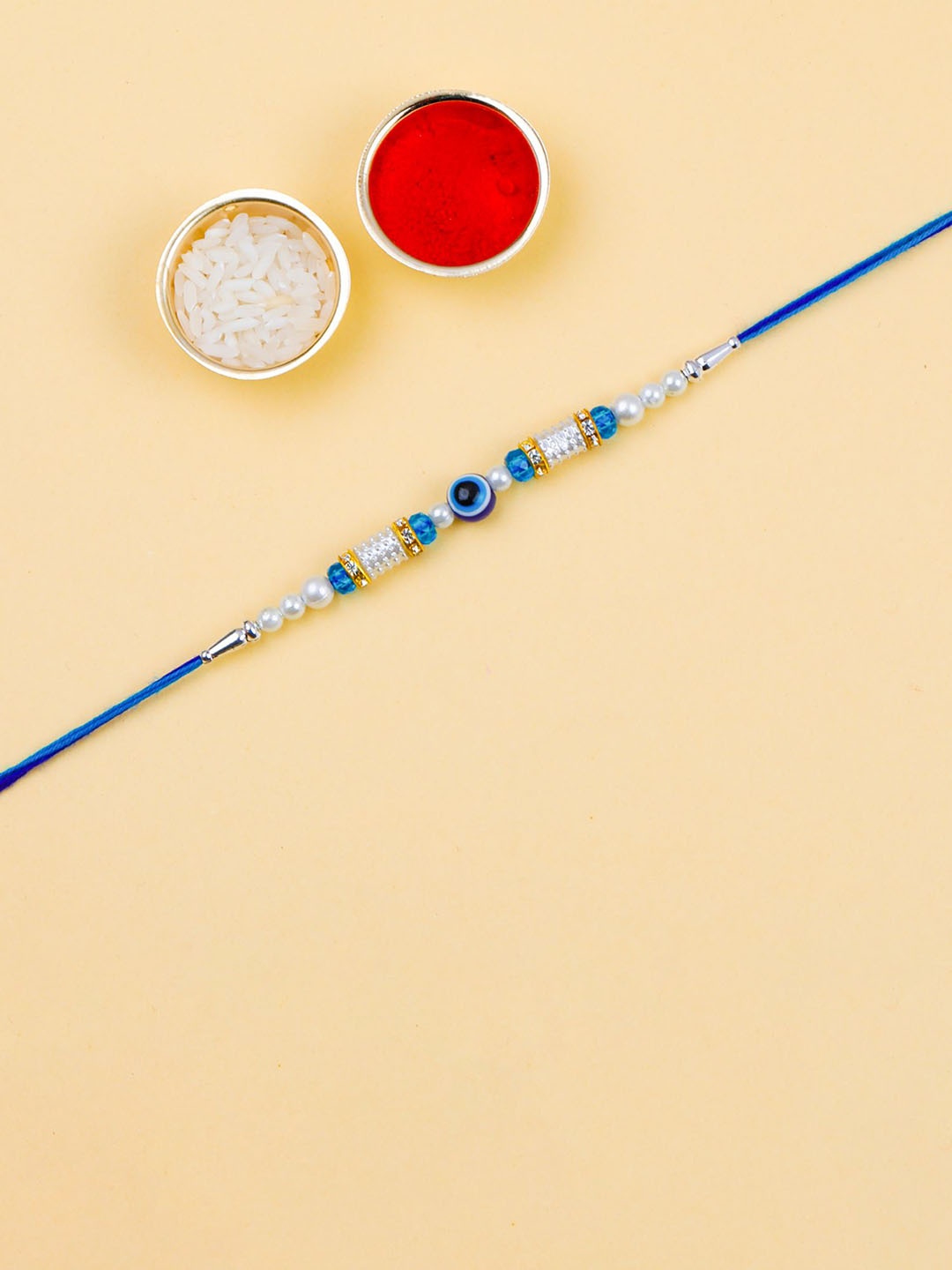 

Silver Shine Bhaiya Bhabhi Rakhi With Pooja Thali & Roli Chawal, Blue