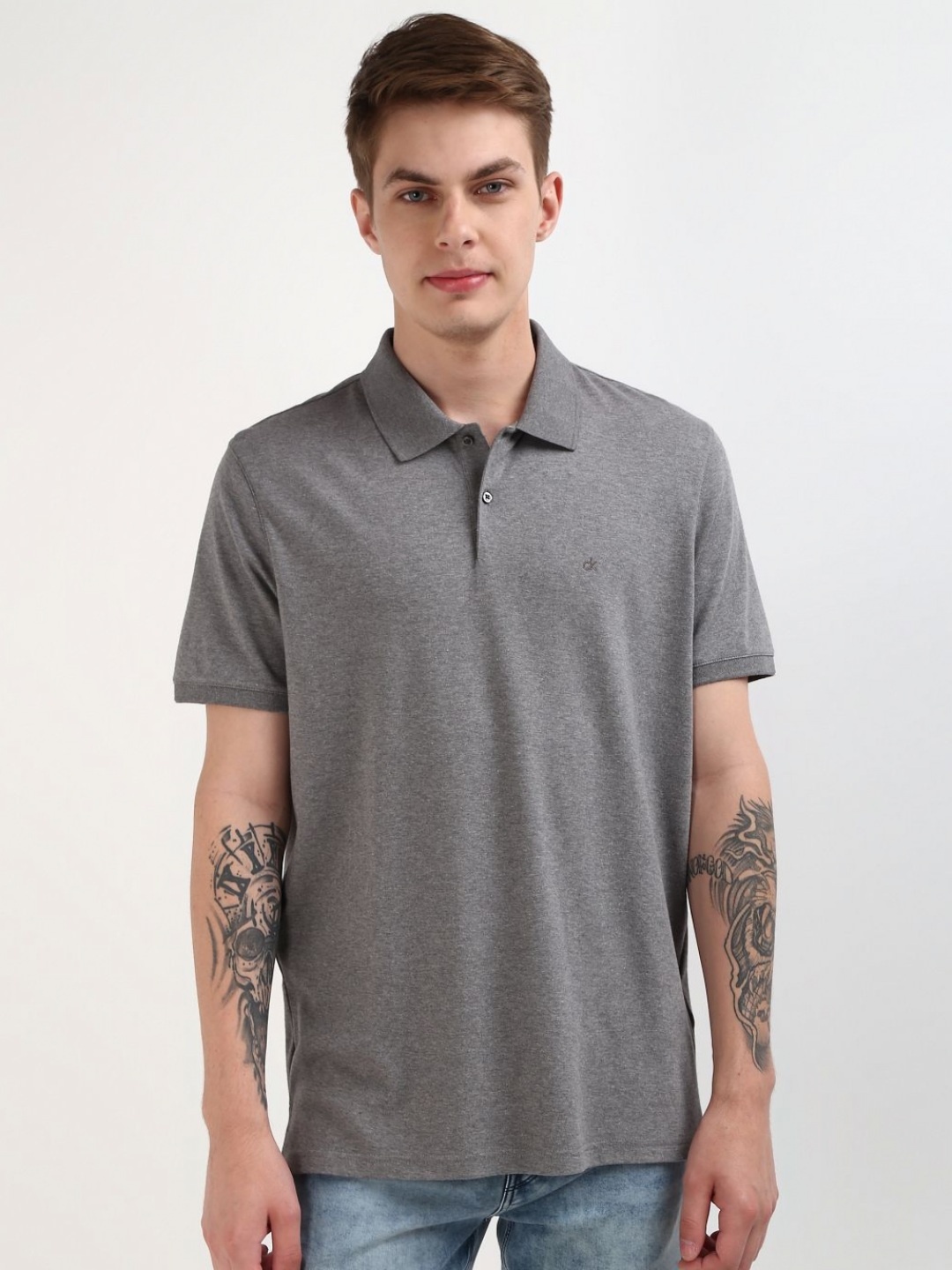 

Calvin Klein Jeans Men Solid Polo Collar Pure Cotton Tshirt, Grey