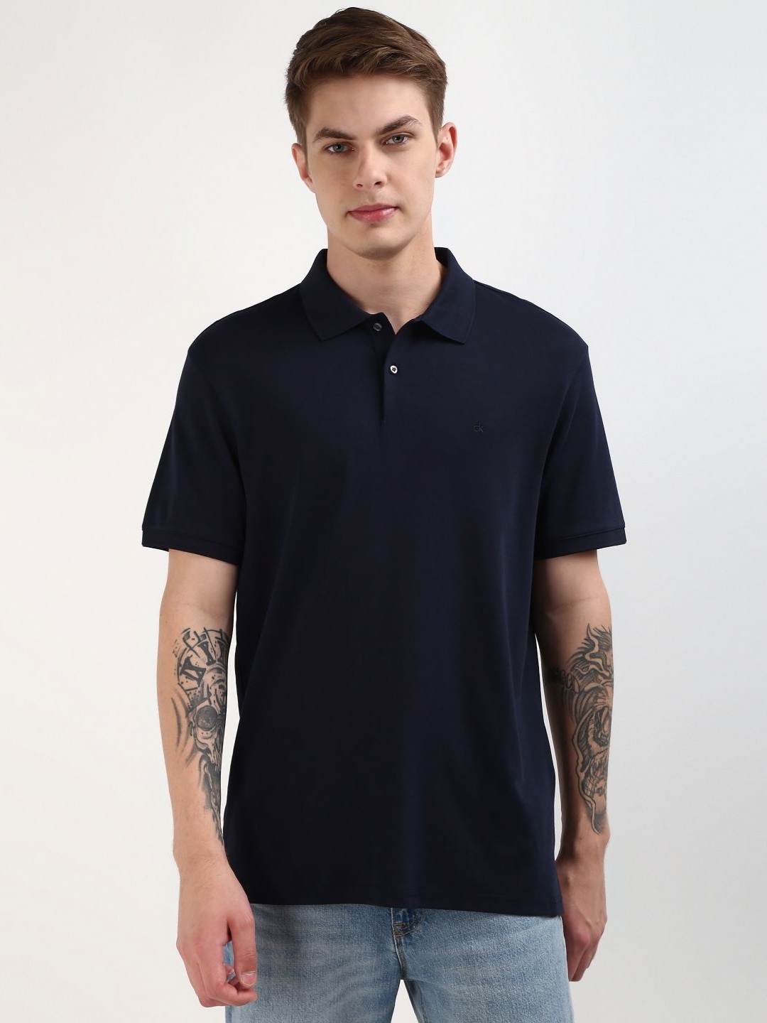 

Calvin Klein Jeans Men Solid Polo Collar Pure Cotton Tshirt, Navy blue