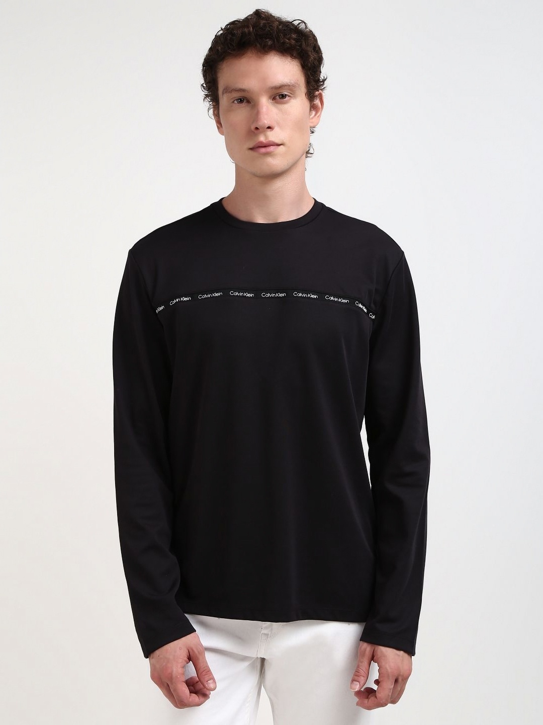 

Calvin Klein Jeans Men Solid Round Neck Cotton Tshirt, Black