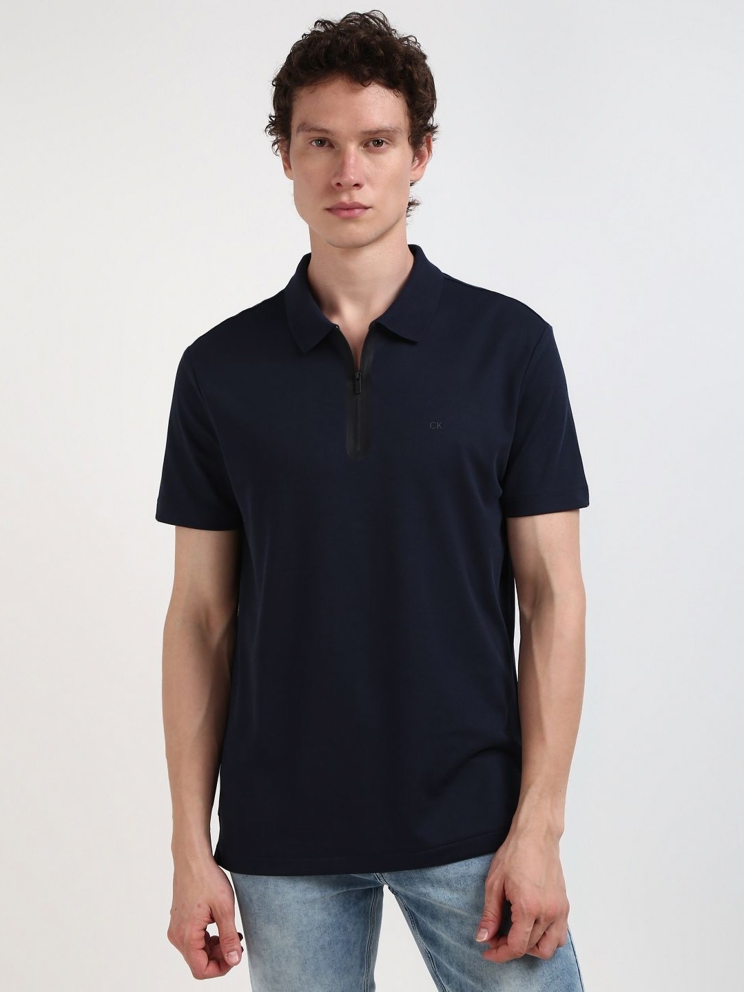 

Calvin Klein Jeans Men Solid Polo Collar Cotton Tshirt, Navy blue