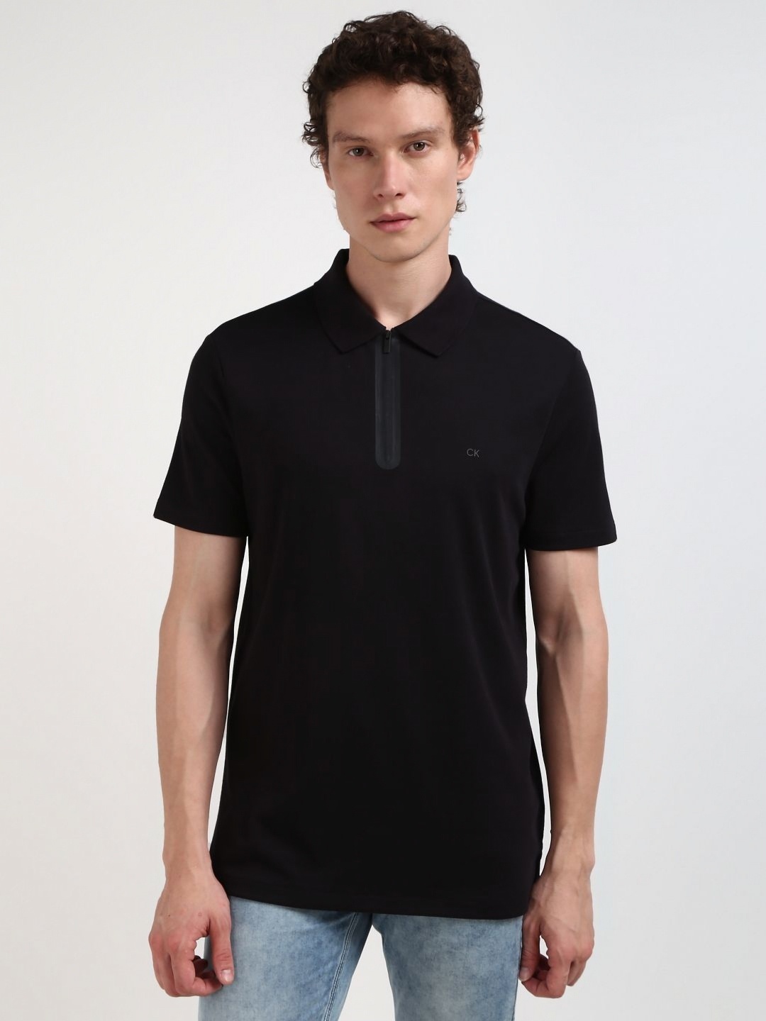 

Calvin Klein Jeans Men Solid Polo Collar Cotton Tshirt, Black