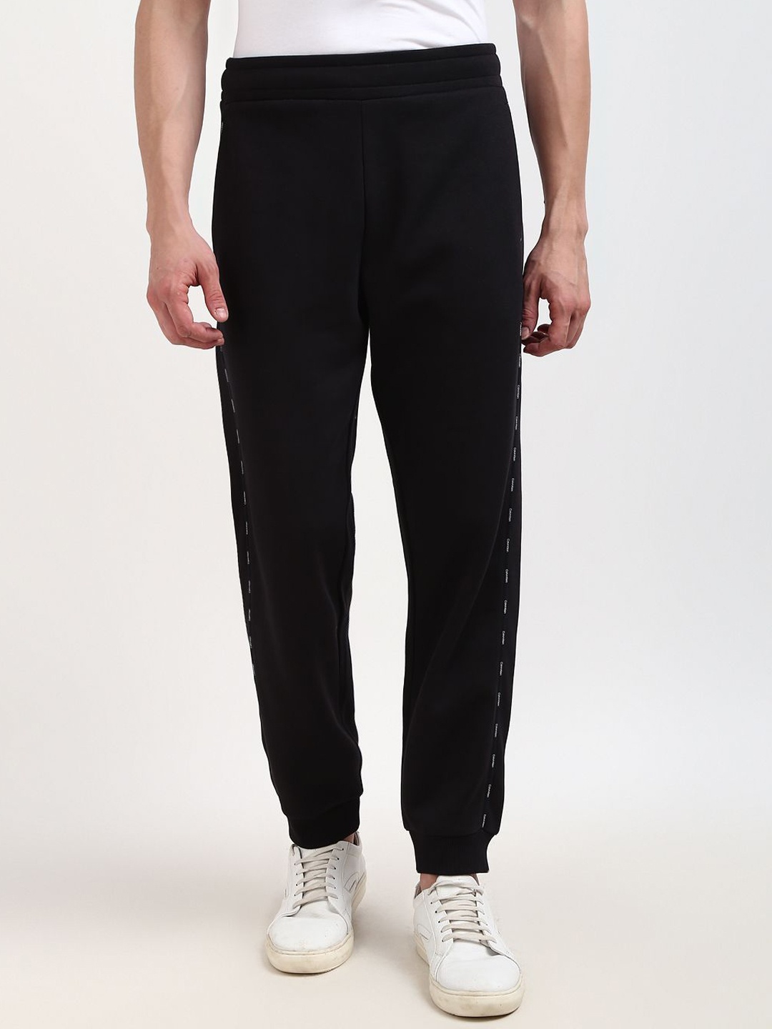

Calvin Klein Jeans Men Mid Rise Joggers, Black