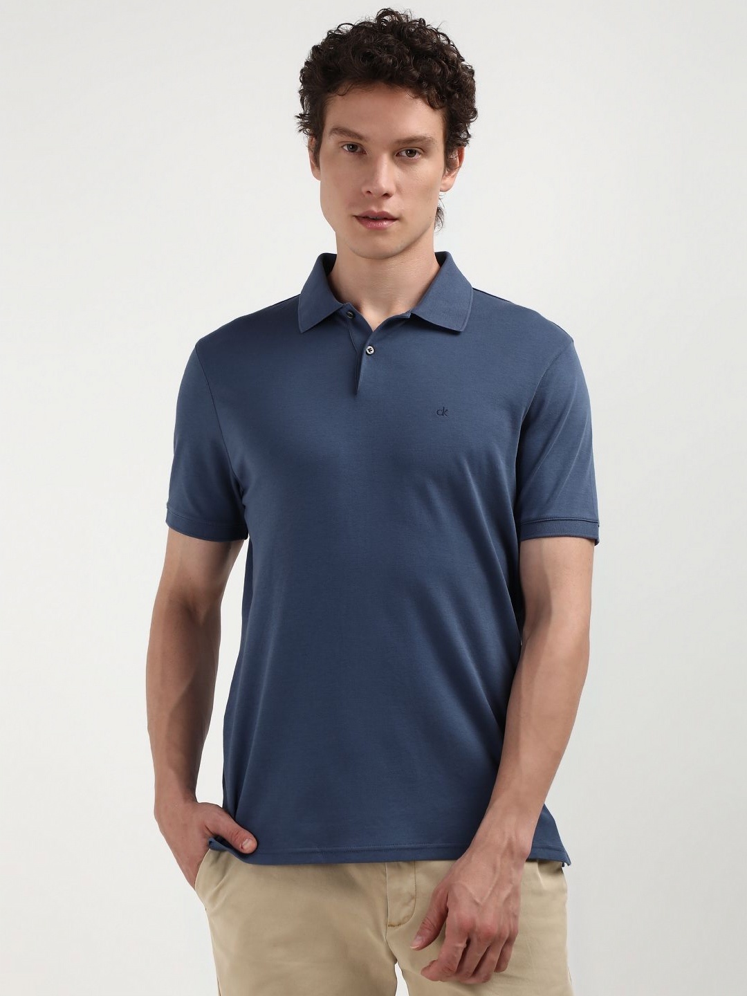 

Calvin Klein Jeans Men Solid Polo Collar Pure Cotton Tshirt, Navy blue