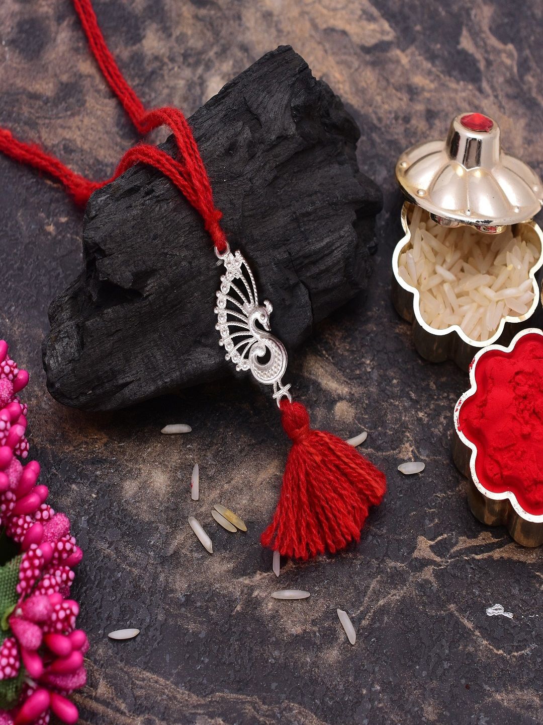 

Abhooshan Peacock Thread Rakhi With Roli Chawal, Red