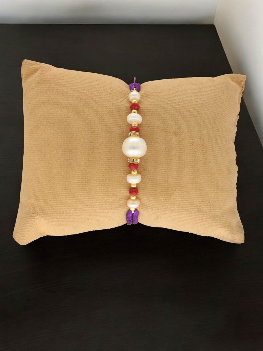 

Sri Jagdamba Pearls Dealer Fresh Water Pearls Thread Rakhi, Gold