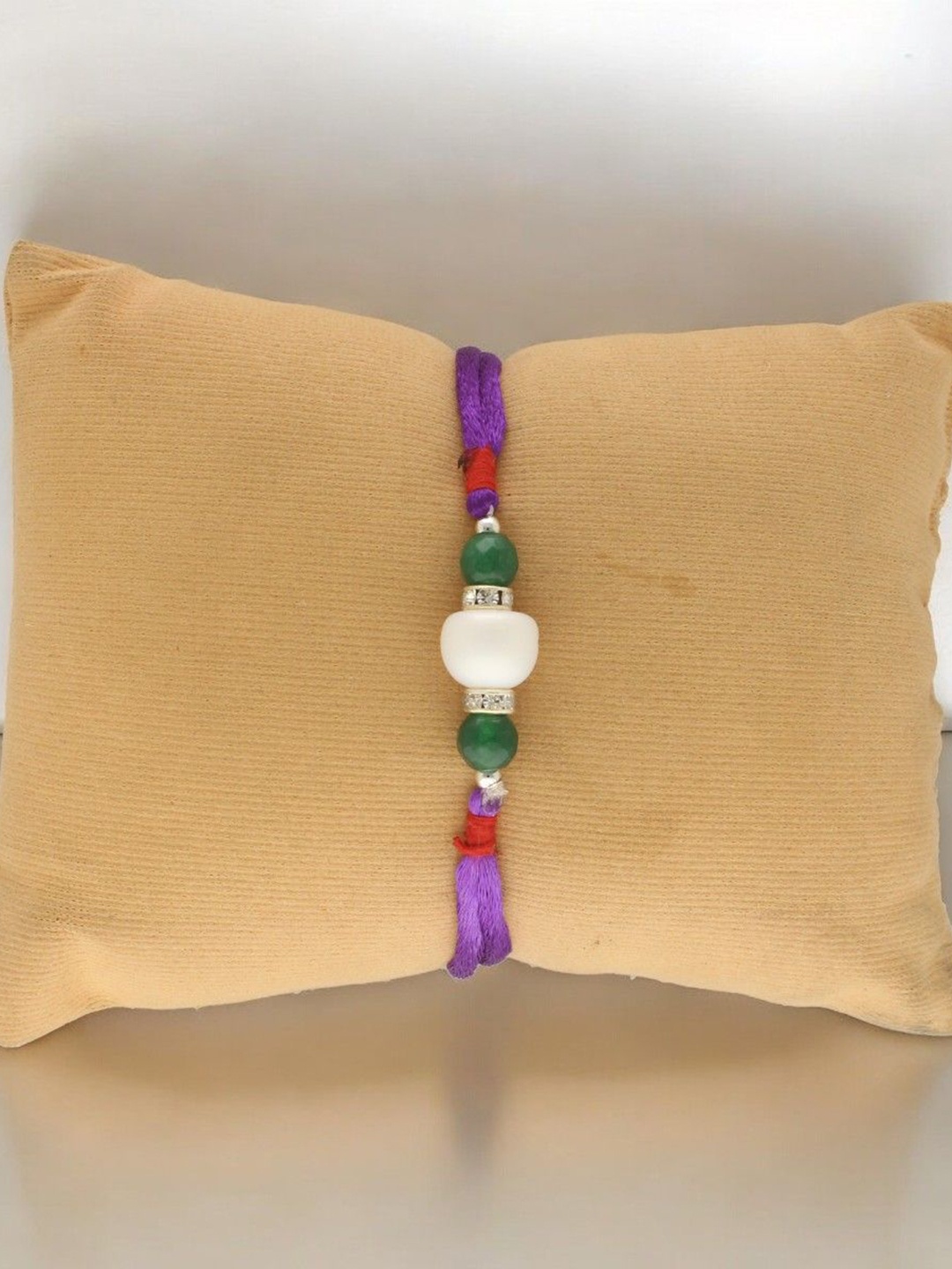 

Sri Jagdamba Pearls Dealer Fresh Water Pearl Beaded Thread Rakhi, Silver